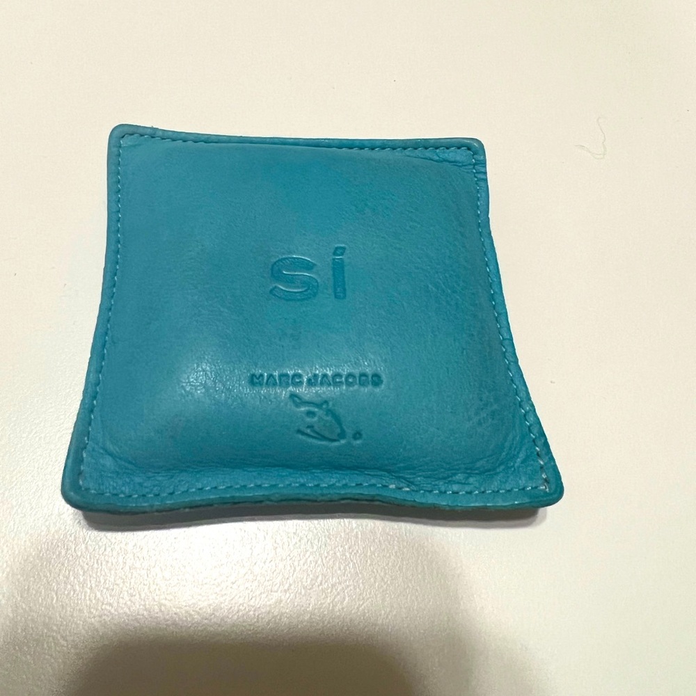Teal leather Marc Jacob’s bean paper weight